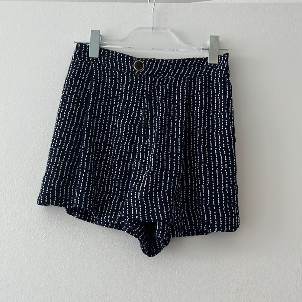 ADORABLE anthropologie navy shorts with white dot pattern